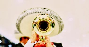 Mexican playing the trumpet